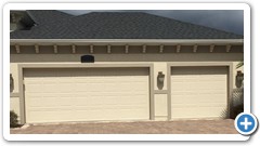 Standard 3-car garage doors with raised panels