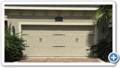 Steel carriage house garage door